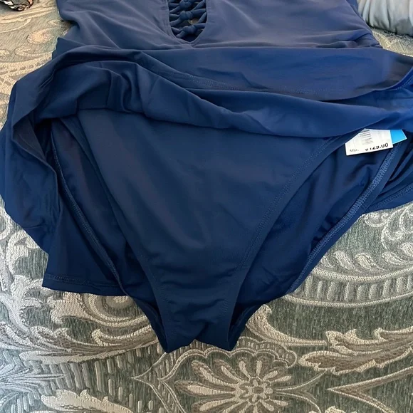 Two swim dresses. Blue is NWT, gray was barely used. Size 8 - Picture 7 of 9